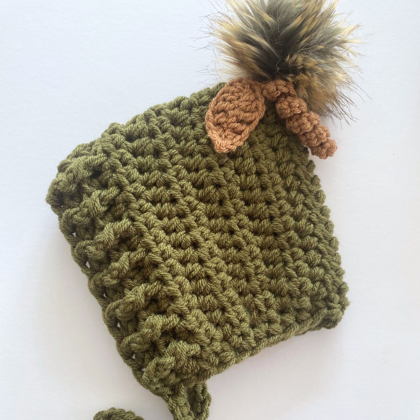 Pumpkin Pixie bonnet with pompom, twizzle and leaf