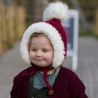 Christmas Fur trimmed pixie bonnet with faux fur pompom